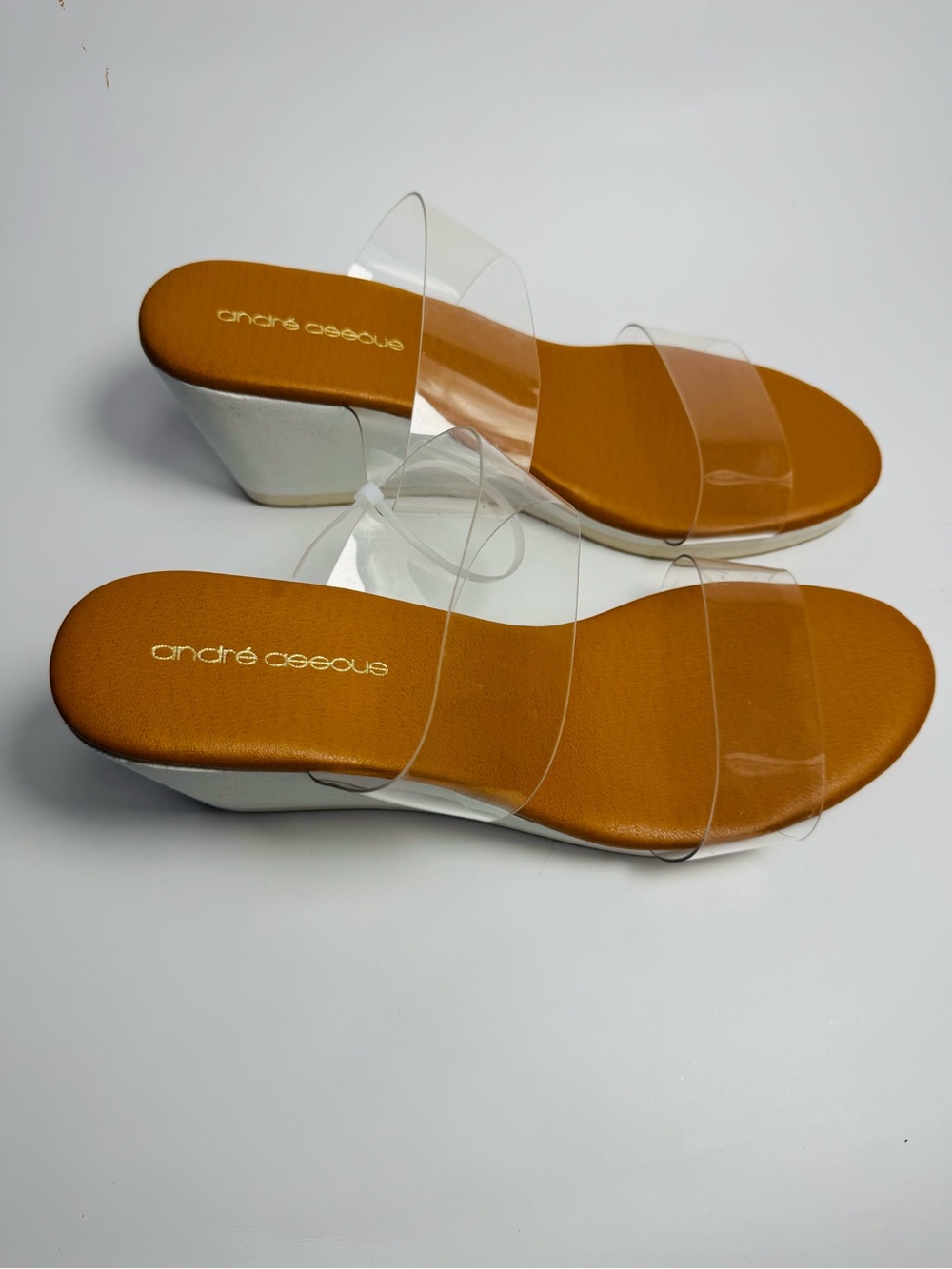 Andre Assous Clear-Strap Wedge Sandals with Tan Footbed and White Wedge